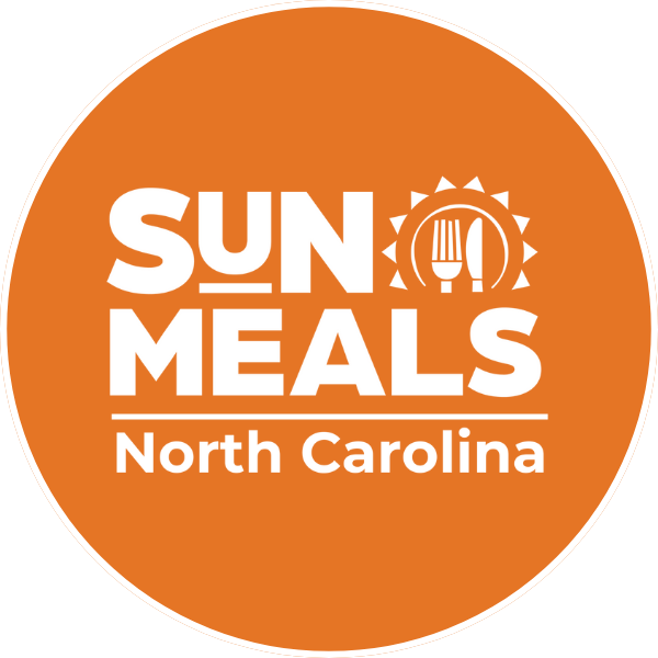 SUN Meals North Carolina logo in white on an orange circle for link to summermeals4nckids.org website